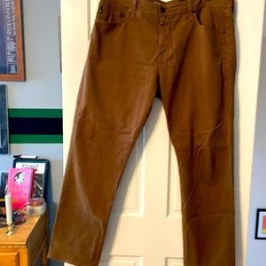 AG Tan Everett jeans.